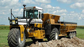 Tractor And Manure Spreader.